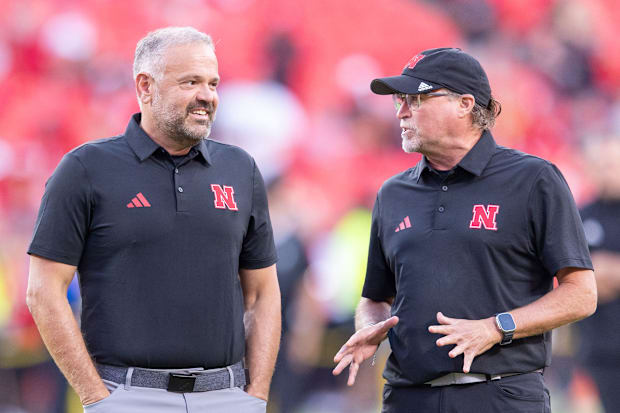 Nebraska head coach Matt Rhule and offensive coordinator Dana Holgorsen before the 2025 Cincinnati game