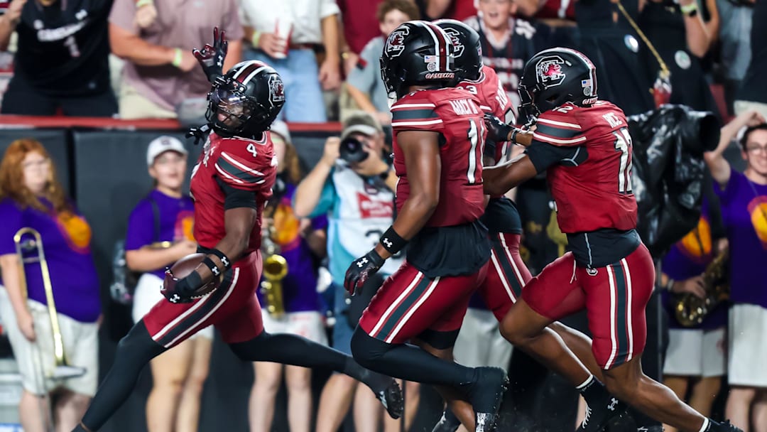 Sep 6, 2025; Columbia, South Carolina, USA; South Carolina Gamecocks defensive back Vicari Swain (4) celebrates his second punt return touchdown against the South Carolina State Bulldogs in the second quarter at Williams-Brice Stadium. Mandatory Credit: Jeff Blake-Imagn Images
