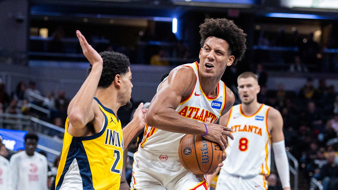 Oct 31, 2025; Indianapolis, Indiana, USA; Atlanta Hawks forward Jalen Johnson (1) dribbles the ball while Indiana Pacers guard Ben Sheppard (26) defends in the second half at Gainbridge Fieldhouse. Mandatory Credit: Trevor Ruszkowski-Imagn Images