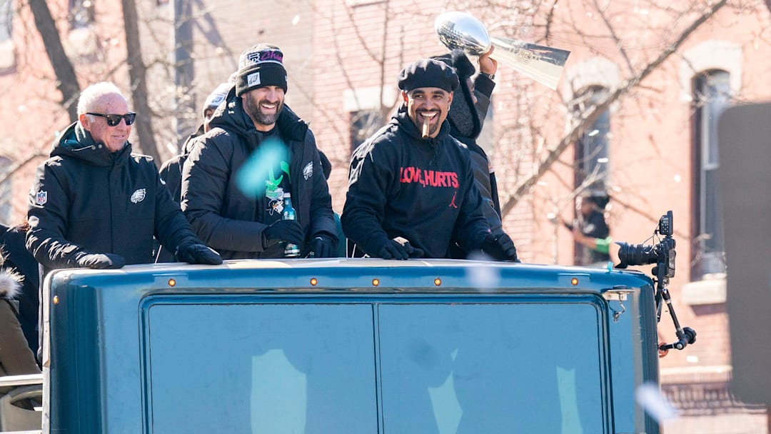 Philadelphia Eagles owner Jeffrey Lurie, left, joins head coach Nick Sirianni and quarterback Jalen Hurts atop one of the team buses during the Super Bowl 59 victory parade along S. Broad Street in Philadelphia, PA, on Friday, Feb. 14, 2025. Philadelphia Eagles owner Jeffrey Lurie, left, joins head coach Nick Sirianni and quarterback Jalen Hurts atop one of the team buses during the Super Bowl 59 victory parade along S. Broad Street in Philadelphia, PA, on Friday, Feb. 14, 2025.