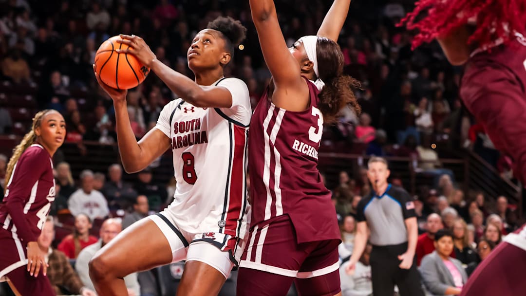 Feb 5, 2026; Columbia, South Carolina, USA; South Carolina Gamecocks forward Joyce Edwards (8) drives past Mississippi State Bulldogs forward Kharyssa Richardson (33) in the first half at Colonial Life Arena. Mandatory Credit: Jeff Blake-Imagn Images Feb 5, 2026; Columbia, South Carolina, USA; South Carolina Gamecocks forward Joyce Edwards (8) drives past Mississippi State Bulldogs forward Kharyssa Richardson (33) in the first half at Colonial Life Arena. Mandatory Credit: Jeff Blake-Imagn Images
