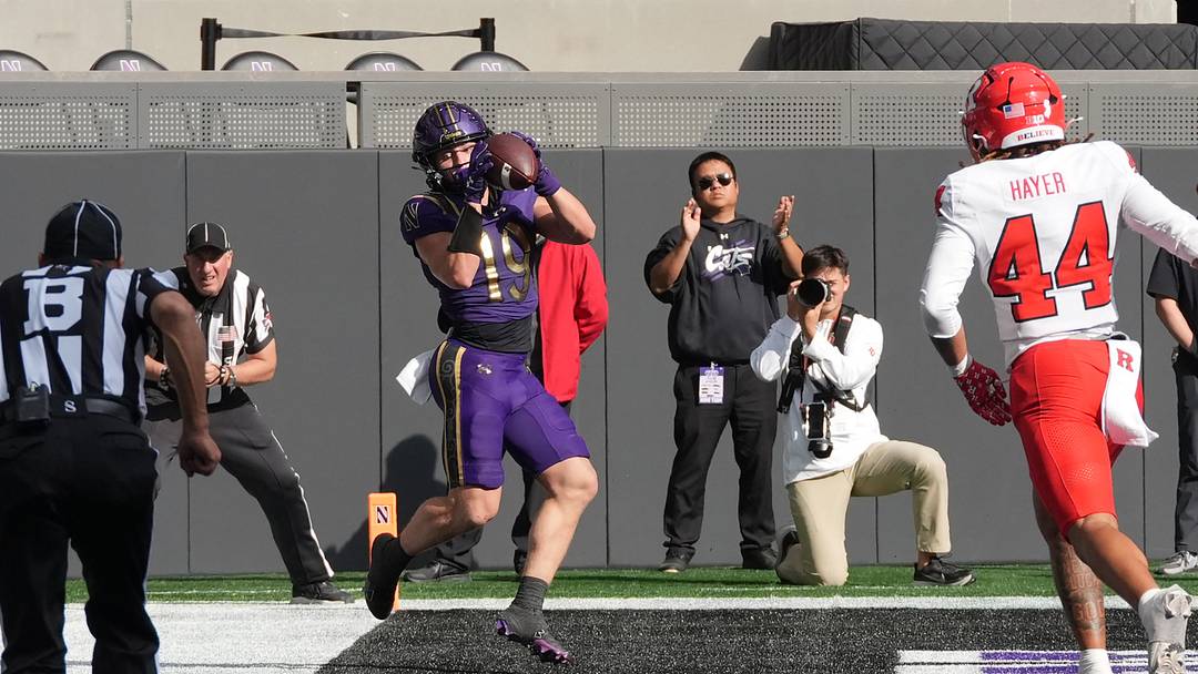 Oct 24, 2026; Evanston, Illinois, USA;  Northwestern Wildcats wide receiver Drew Wagner (19) catches a touchdown pass against the Rutgers Scarlet Knights during the second half at New Ryan Field.  Mandatory Credit: David Banks-Imagn Images