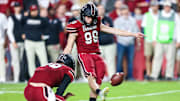 Oct 22, 2022; Columbia, South Carolina, USA; South Carolina Gamecocks place kicker Mitch Jeter (98) makes a field goal against the Texas A&M Aggies in the first quarter at Williams-Brice Stadium. Mandatory Credit: Jeff Blake-Imagn Images
