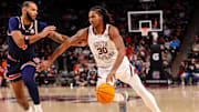 Jan 11, 2025; Columbia, South Carolina, USA; South Carolina Gamecocks forward Collin Murray-Boyles (30) controls the ball as Auburn Tigers forward Johni Broome (4) defends n the first half at Colonial Life Arena. Mandatory Credit: Jeff Blake-Imagn Images