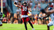 Aug 31, 2024; Columbia, South Carolina, USA; South Carolina Gamecocks punter Kai Kroeger (39) throws a pass on a punt fake against the Old Dominion Monarchs in the second quarter at Williams-Brice Stadium. The play was called back due to a penalty. Mandatory Credit: Jeff Blake-Imagn Images