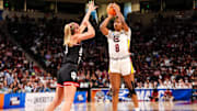 Mar 23, 2025; Columbia, South Carolina, USA; South Carolina Gamecocks forward Joyce Edwards (8) shoots over Indiana Hoosiers guard Sydney Parrish (33) in the first half at Colonial Life Arena. Mandatory Credit: Jeff Blake-Imagn Images
