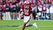 Nov 23, 2024; Columbia, South Carolina, USA; South Carolina Gamecocks quarterback LaNorris Sellers (16) scrambles against the Wofford Terriers in the first quarter at Williams-Brice Stadium. Mandatory Credit: Jeff Blake-Imagn Images