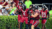 Sep 6, 2025; Columbia, South Carolina, USA; South Carolina Gamecocks defensive back Vicari Swain (4) celebrates his second punt return touchdown against the South Carolina State Bulldogs in the second quarter at Williams-Brice Stadium. Mandatory Credit: Jeff Blake-Imagn Images