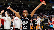 Indiana Hoosiers guard Chloe Moore-McNeil (22) celebrates with teammates following their 76-68 win over the Utah Utes at Colonial Life Arena.
