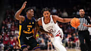 Dec 7, 2024; Columbia, South Carolina, USA; South Carolina Gamecocks forward Collin Murray-Boyles (30) drives around East Carolina Pirates guard RJ Felton (3) in the first half at Colonial Life Arena. Mandatory Credit: Jeff Blake-Imagn Images