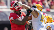 Sep 24, 2022; Athens, Georgia, USA; Georgia Bulldogs offensive lineman Warren McClendon (70) loses his helmet to Kent State Golden Flashes defensive lineman Oliver Billotte (97) at Sanford Stadium. Mandatory Credit: Dale Zanine-Imagn Images