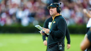 Nov 16, 2024; Columbia, South Carolina, USA; Missouri Tigers head coach Eliah Drinkwitz directs his team against the South Carolina Gamecocks in the first quarter at Williams-Brice Stadium. Mandatory Credit: Jeff Blake-Imagn Images