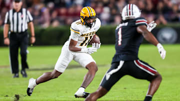 Nov 16, 2024; Columbia, South Carolina, USA; Missouri Tigers running back Kewan Lacy (11) runs the ball against the South Carolina Gamecocks in the second half at Williams-Brice Stadium. Mandatory Credit: Jeff Blake-Imagn Images