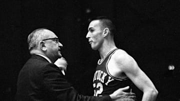 Kentucky head coach Adolph Rupp, left, talks with one of his players before sending him into the game against Vanderbilt Jan. 9, 1961. The Wildcats became the Commodores' 11th straight victim, falling 64-62 before 7,324 fans at Memorial Gym.

Title Sec Basketball