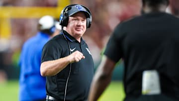 Sep 27, 2025; Columbia, South Carolina, USA; Kentucky Wildcats head coach Mark Stoops celebrates a touchdown against the South Carolina Gamecocks in the first quarter at Williams-Brice Stadium. Mandatory Credit: Jeff Blake-Imagn Images