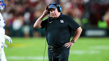 Sep 27, 2025; Columbia, South Carolina, USA; Kentucky Wildcats head coach Mark Stoops directs his team against the South Carolina Gamecocks in the second quarter at Williams-Brice Stadium. Mandatory Credit: Jeff Blake-Imagn Images