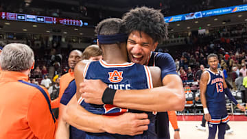 Jan 11, 2025; Columbia, South Carolina, USA;  Auburn Tigers guard Denver Jones (2) and guard Chad Baker-Mazara (10) celebrate after defeating the South Carolina Gamecocks at Colonial Life Arena. Mandatory Credit: Jeff Blake-Imagn Images