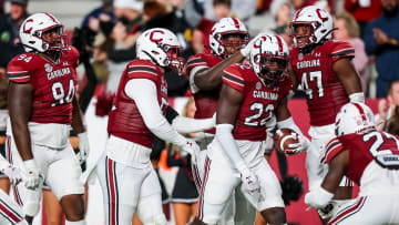 South Carolina football linebacker Bam Martin-Scott celebrating with his teammates after an interception