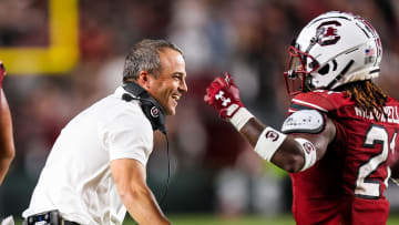 South Carolina football head coach Shane Beamer with running back Juju McDowell during the 2022 season