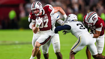 Sep 21, 2024; Columbia, South Carolina, USA;  South Carolina Gamecocks tight end Brady Hunt (87) runs after a catch against the Akron Zips in the second quarter at Williams-Brice Stadium. Mandatory Credit: Jeff Blake-Imagn Images