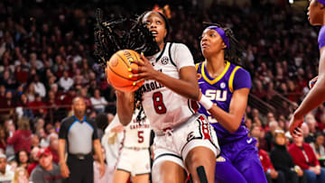 Jan 24, 2025; Columbia, South Carolina, USA; South Carolina Gamecocks forward Joyce Edwards (8) drives past LSU Lady Tigers forward Sa'Myah Smith (5) in the first half at Colonial Life Arena. Mandatory Credit: Jeff Blake-Imagn Images