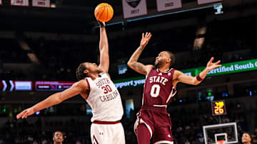 Jan 25, 2025; Columbia, South Carolina, USA; South Carolina Gamecocks forward Collin Murray-Boyles (30) blocks the shot of Mississippi State Bulldogs guard Claudell Harris Jr. (0) in the second half at Colonial Life Arena. Mandatory Credit: Jeff Blake-Imagn Images