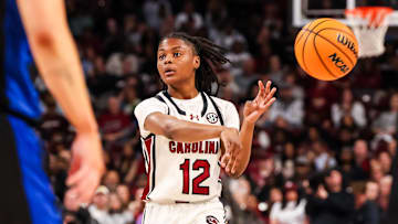 Mar 2, 2025; Columbia, South Carolina, USA; South Carolina Gamecocks guard MiLaysia Fulwiley (12) makes a no-look pass against the Kentucky Wildcats in the first half at Colonial Life Arena. Mandatory Credit: Jeff Blake-Imagn Images