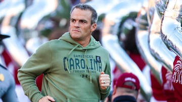 Nov 23, 2024; Columbia, South Carolina, USA; South Carolina Gamecocks head coach Shane Beamer takes the field with his team before a game against the Wofford Terriers at Williams-Brice Stadium. Mandatory Credit: Jeff Blake-Imagn Images