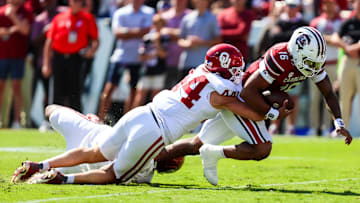 Oct 18, 2025; Columbia, South Carolina, USA; South Carolina Gamecocks quarterback Lanorris Sellers (16) is brought down on fourth and goal by Oklahoma Sooners defensive lineman Taylor Wein (44) in the first quarter at Williams-Brice Stadium. Mandatory Credit: Jeff Blake-Imagn Images