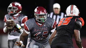 Raines Vikings Solomon Thomas (65) protects his quarterback from Andrew Jackson Tigers King Massey