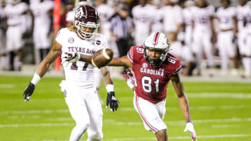 Nov 7, 2020; Columbia, South Carolina, USA; South Carolina Gamecocks wide receiver Jalen Brooks (81) has a long pass go off his fingertips for an incompletion as Texas A&M Aggies defensive back Jaylon Jones (17) defends in the first quarter at Williams-Brice Stadium. Mandatory Credit: Jeff Blake-USA TODAY Sports