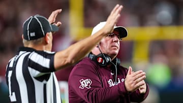 Nov 2, 2024; Columbia, South Carolina, USA; Texas A&M Aggies head coach Mike Elko calls a timeout against the South Carolina Gamecocks in the second quarter at Williams-Brice Stadium. Mandatory Credit: Jeff Blake-Imagn Images