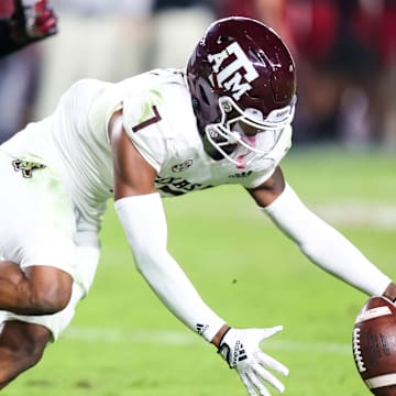 Oct 22, 2022; Columbia, South Carolina, USA; Texas A&M Aggies defensive back Tyreek Chappell (7) recovers a blocked extra point against the South Carolina Gamecocks in the second half at Williams-Brice Stadium. Mandatory Credit: Jeff Blake-Imagn Images