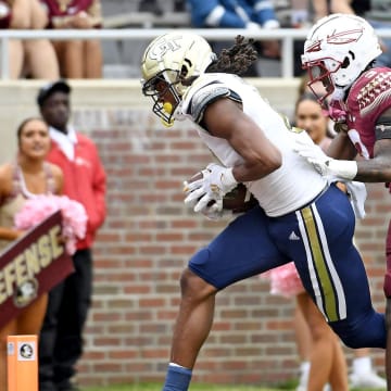 Oct 29, 2022; Tallahassee, Florida, USA; Georgia Tech Yellow Jackets wide receiver EJ Jenkins (0) scores a touchdown against the Florida State Seminoles at Doak S. Campbell Stadium. Mandatory Credit: Melina Myers-USA TODAY Sports