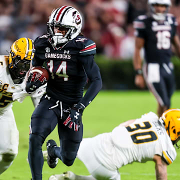 Nov 16, 2024; Columbia, South Carolina, USA; South Carolina Gamecocks wide receiver Jared Brown (14) makes a 38-yard reception against the Missouri Tigers in the second quarter at Williams-Brice Stadium. Mandatory Credit: Jeff Blake-Imagn Images