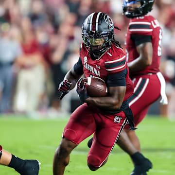 Sep 6, 2025; Columbia, South Carolina, USA; South Carolina Gamecocks running back Rahsul Faison (1) rushed against the South Carolina State Bulldogs in the second quarter at Williams-Brice Stadium. Mandatory Credit: Jeff Blake-Imagn Images