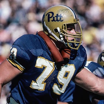Oct 2, 1982, Pittsburgh, PA, USA; FILE PHOTO; Pittsburgh Panthers offensive lineman Bill Fralic (79) against the West Virginia Mountaineers at Pitt Stadium during the 1982 season. Mandatory Credit: Malcolm Emmons-Imagn Images