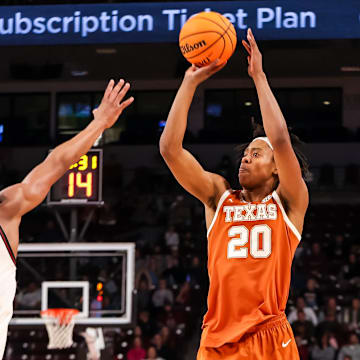 Feb 22, 2025; Columbia, South Carolina, USA; Texas Longhorns guard Tre Johnson (20) shoots over South Carolina Gamecocks guard Zachary Davis (2) in the second half at Colonial Life Arena. Mandatory Credit: Jeff Blake-Imagn Images