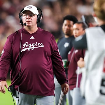 Nov 2, 2024; Columbia, South Carolina, USA; Texas A&M Aggies head coach Mike Elko directs his team against the South Carolina Gamecocks in the second quarter at Williams-Brice Stadium.