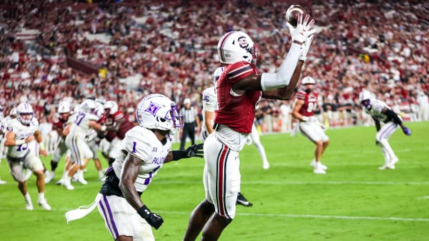 Nyck Harbor catches a pass against Furman