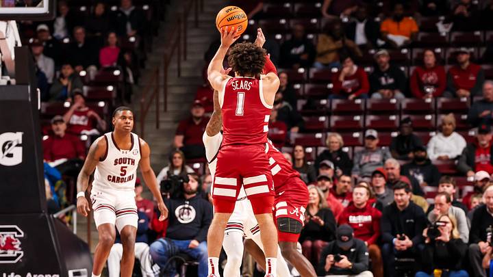 Jan 8, 2025; Columbia, South Carolina, USA; Alabama Crimson Tide guard Mark Sears (1) makes a three point basket against the South Carolina Gamecocks in the first half at Colonial Life Arena. Mandatory Credit: Jeff Blake-Imagn Images