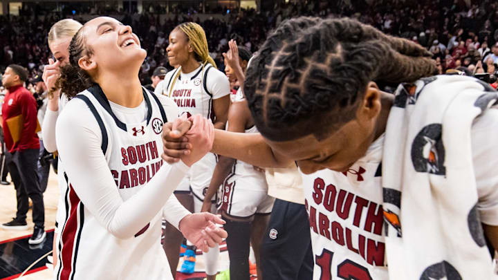 Jan 24, 2025; Columbia, South Carolina, USA; South Carolina Gamecocks guard Tessa Johnson (5) and guard MiLaysia Fulwiley (12) celebrate following their win over the LSU Lady Tigers at Colonial Life Arena. Mandatory Credit: Jeff Blake-Imagn Images