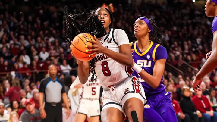 Jan 24, 2025; Columbia, South Carolina, USA; South Carolina Gamecocks forward Joyce Edwards (8) drives past LSU Lady Tigers forward Sa'Myah Smith (5) in the first half at Colonial Life Arena. Mandatory Credit: Jeff Blake-Imagn Images