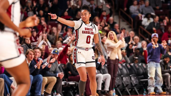 Jan 12, 2025; Columbia, South Carolina, USA; South Carolina Gamecocks guard Te-Hina Paopao (0) celebrates a three point basket against the Texas Longhorns in the first half at Colonial Life Arena. Mandatory Credit: Jeff Blake-Imagn Images
