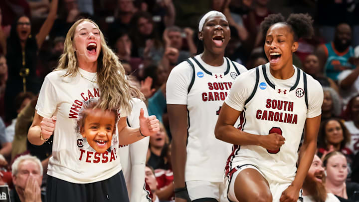 Mar 23, 2026; Columbia, South Carolina, USA; South Carolina Gamecocks forward Chloe Kitts (21), center Madina Okot (11) and forward Joyce Edwards (8) celebrate a play against the USC Trojans in the second half at Colonial Life Arena. Mandatory Credit: Jeff Blake-Imagn Images