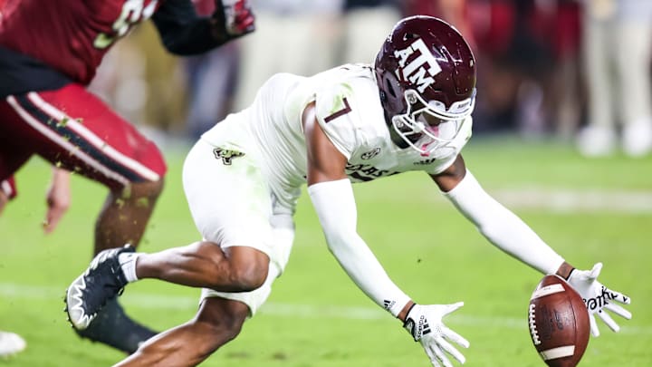 Oct 22, 2022; Columbia, South Carolina, USA; Texas A&M Aggies defensive back Tyreek Chappell (7) recovers a blocked extra point against the South Carolina Gamecocks in the second half at Williams-Brice Stadium. Mandatory Credit: Jeff Blake-Imagn Images