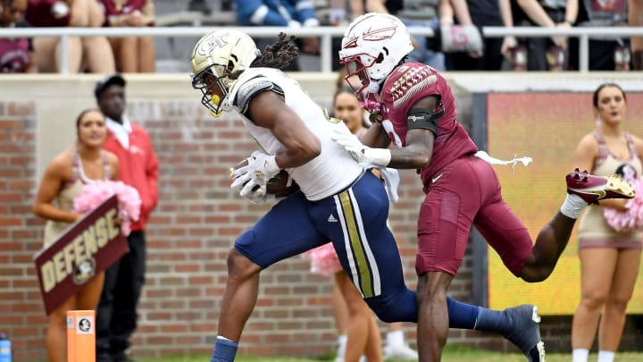 Oct 29, 2022; Tallahassee, Florida, USA; Georgia Tech Yellow Jackets wide receiver EJ Jenkins (0) scores a touchdown against the Florida State Seminoles at Doak S. Campbell Stadium. Mandatory Credit: Melina Myers-USA TODAY Sports