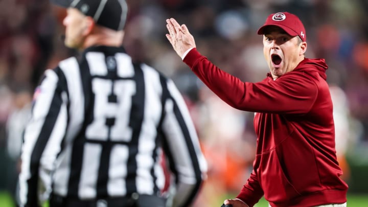 Nov 25, 2023; Columbia, South Carolina, USA; South Carolina Gamecocks head coach Shane Beamer disputes a call in the second quarter against the Clemson Tigers at Williams-Brice Stadium. Mandatory Credit: Jeff Blake-USA TODAY Sports