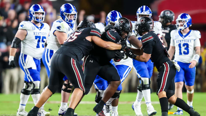 Nov 18, 2023; Columbia, South Carolina, USA; South Carolina Gamecocks defensive tackle Tonka Hemingway (91) recovers a fumble to seal the win over the Kentucky Wildcats in the fourth quarter at Williams-Brice Stadium. Mandatory Credit: Jeff Blake-USA TODAY Sports Kentucky