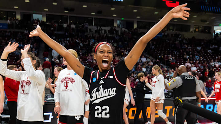 Indiana Hoosiers guard Chloe Moore-McNeil (22) celebrates with teammates following their 76-68 win over the Utah Utes at Colonial Life Arena. Indiana Hoosiers guard Chloe Moore-McNeil (22) celebrates with teammates following their 76-68 win over the Utah Utes at Colonial Life Arena.
